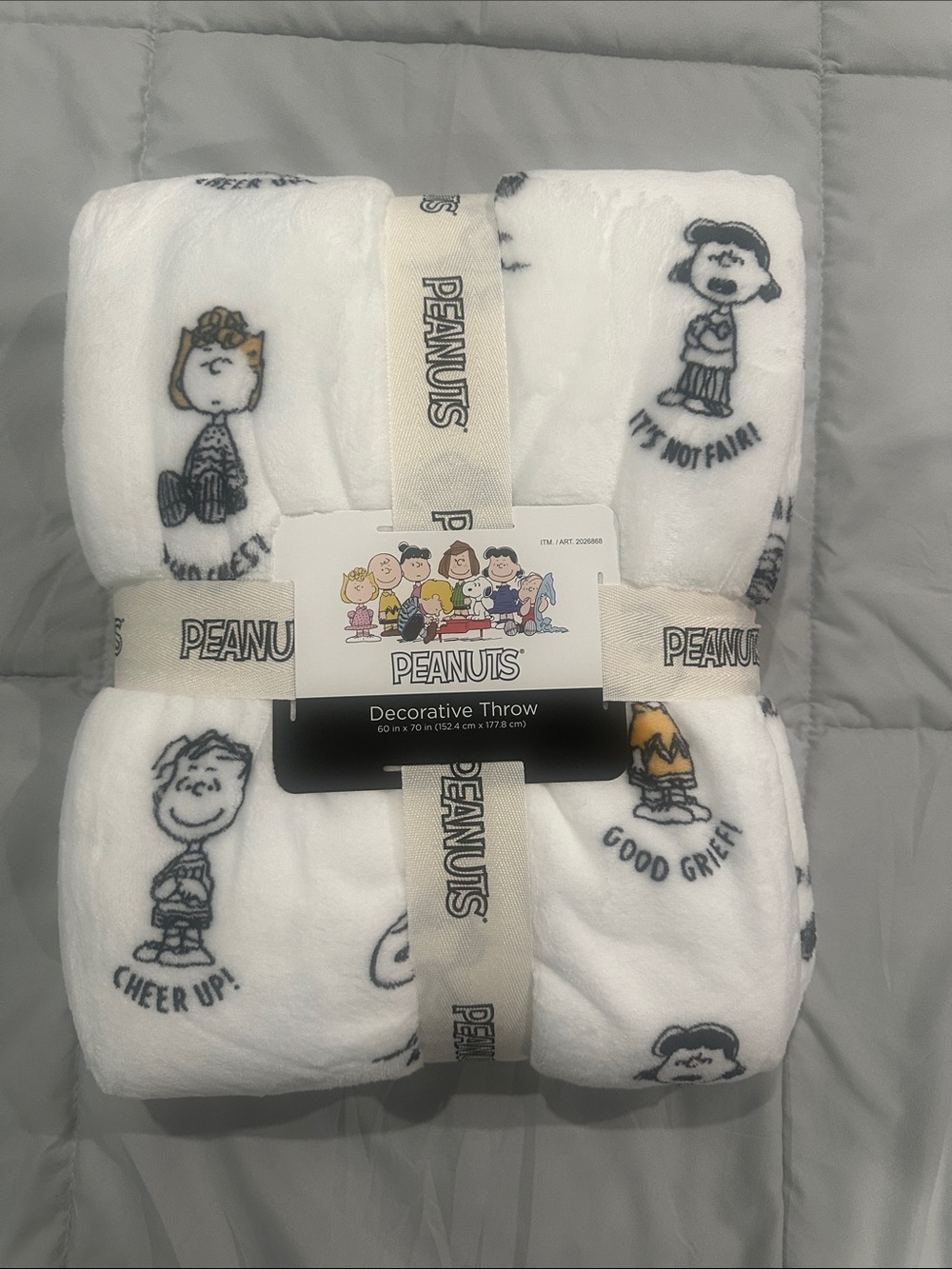 Peanuts White Decorative Throw with Black Character Prints and Yellow Accents